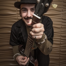 Tyler Gilbert with guitar